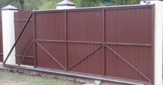 Купить откатные ворота из профнастила Кыштым, цена от 1786 руб.